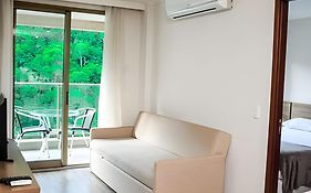 FLAT VPM - Cozinha, Varanda, Ar Cond, Estacionamento, Cama Queen, Vista Incrível, 400mb Wi-fi, TV Smart, Serviços de Streaming, Ducha Forte, Próximo a Barra da Tijuca e Recreio, 10min de carro da Praia